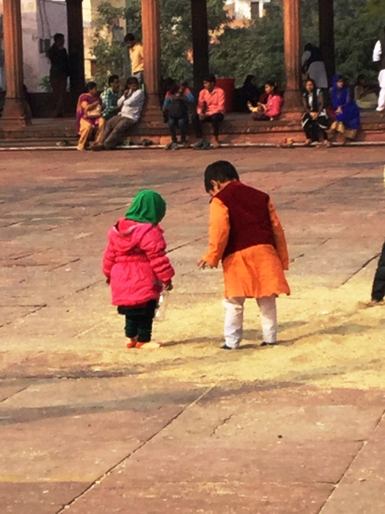 Amidst the visiting crowds and the chaos of the city we spot a beautiful miracle of God. A little boy guides his younger sister on the way to the mosque with utmost care and love. In their companionship and the bond of mutual trust we discover the beauty of life itself. Photography: Kavya