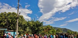 Venezuelan migrants receive food and medicine from the Red Cross near the Colombia-Venezuela border, February 2021. Schneyder Mendoza/AFP via Getty Images