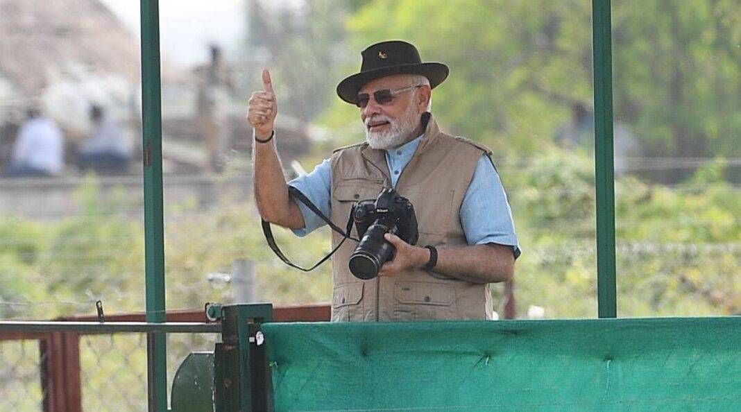 Prime Minister Narendra Modi poses after opening the quarantine enclosure's door to release the cheetahs at Kuno National Park in Madhya Pradesh. (Via PM's Office)