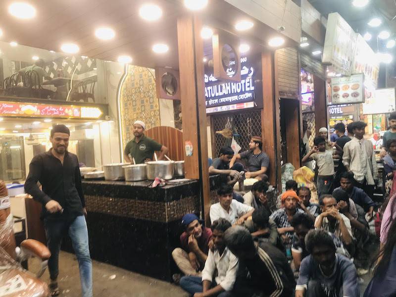 During the month of Ramadan, small and big eateries in the lanes of Purani Dilli offer free food to the poor and needy. Here a group of people can be seen waiting for food in front of a popular eateries.